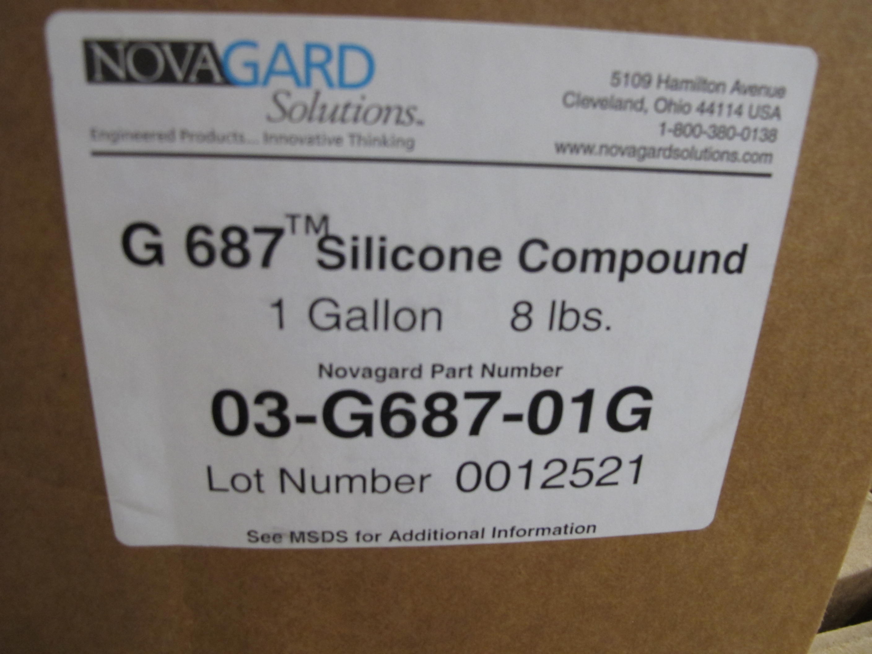 (214 1 GALLON CONTAINERS) NOVAGARD SOLUTIONS G 687, SILICONE COMPOUND. LOADING & HANDLING FEE $15-4101